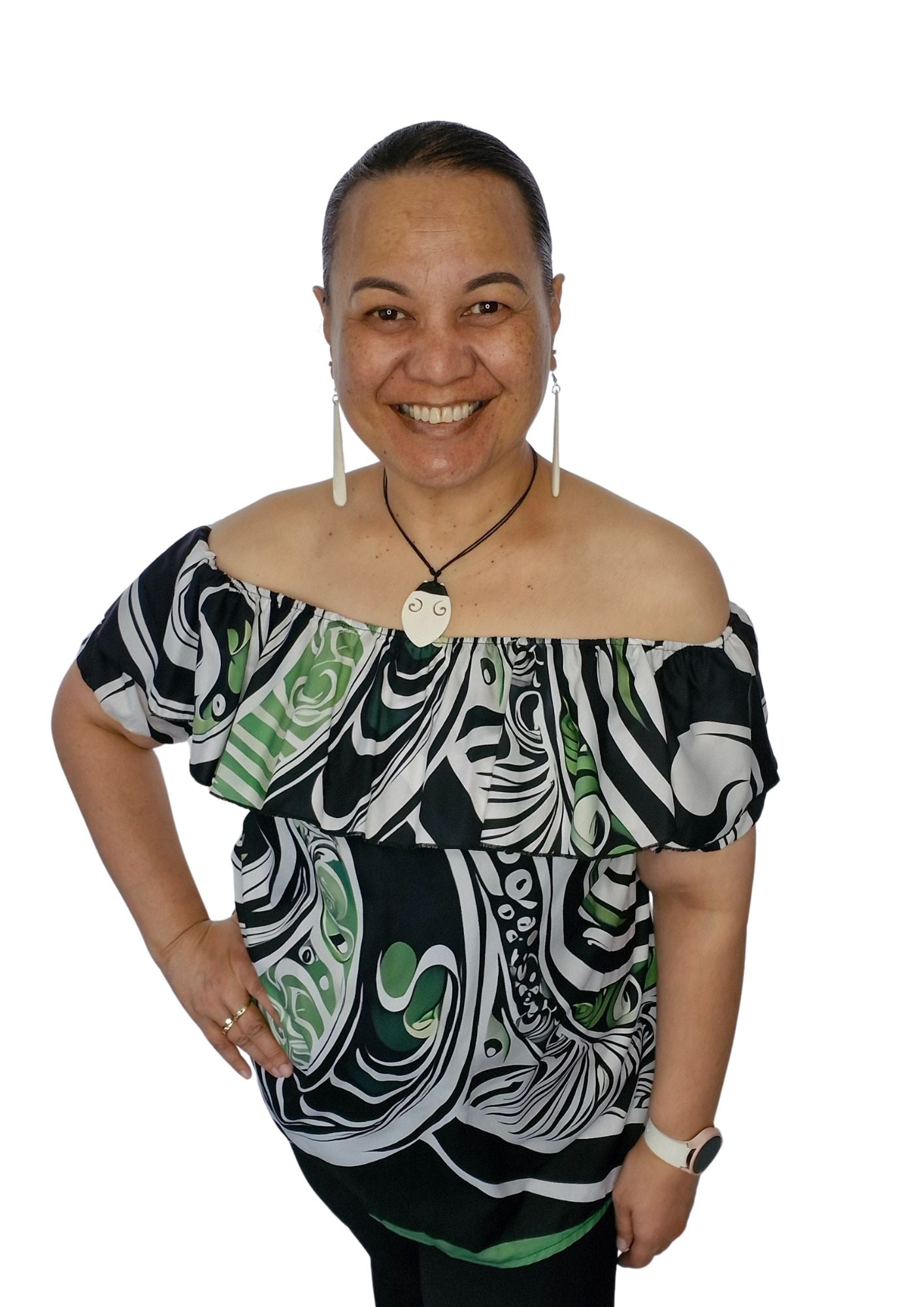 Maia Koru Blouse featuring Māori-inspired design with flowing koru patterns